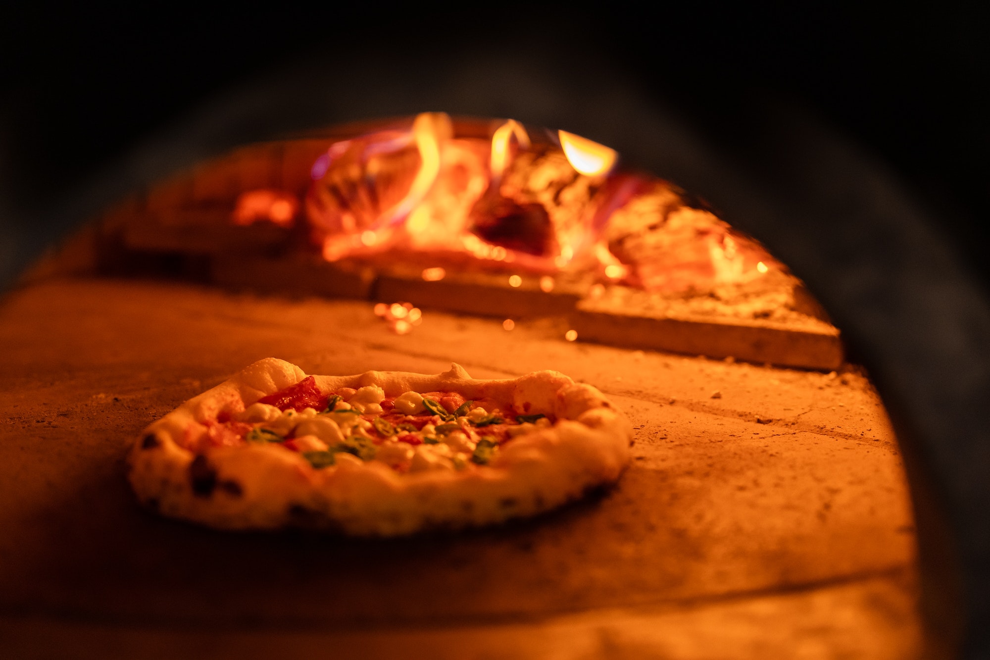 Making italian traditional pizza in the restaurant. Food concept. Cooking with traditions